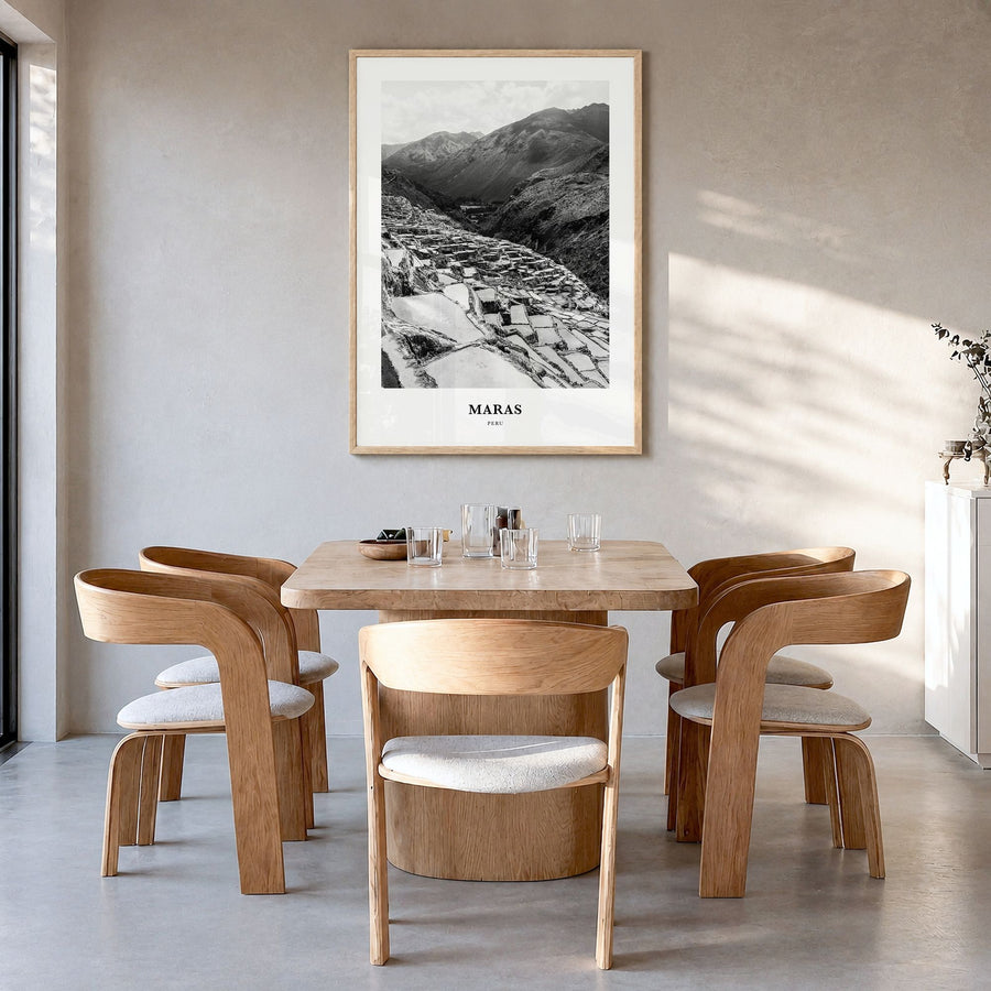 Maras Classic Poster in a natural wood frame, hanging in a dining room