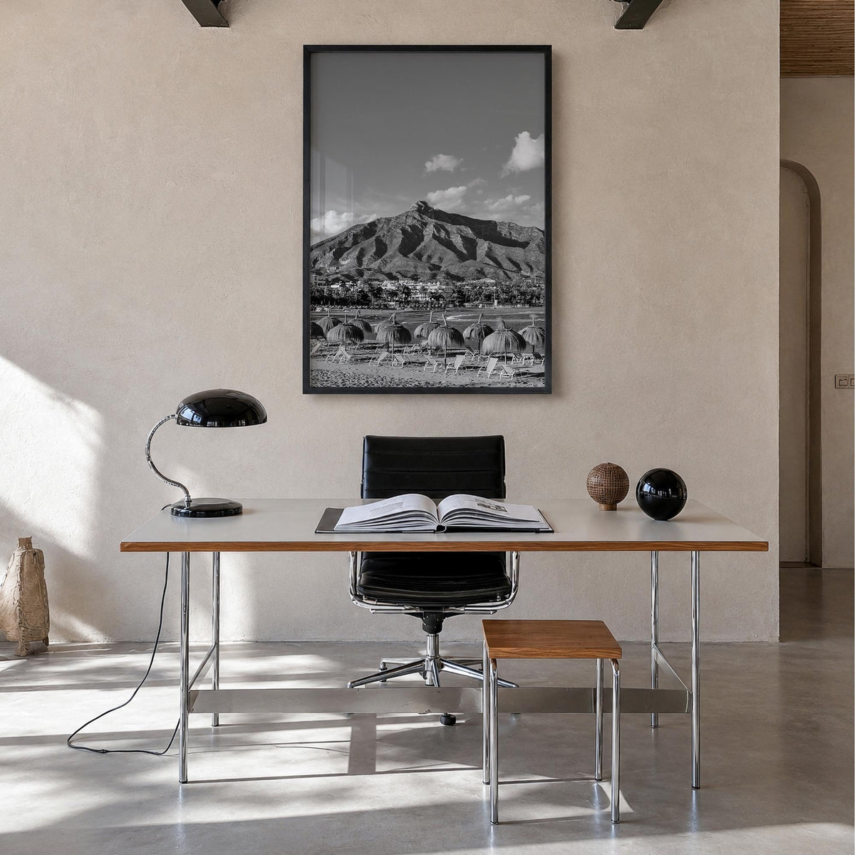 Marbella black & white photo poster of Spain – vertical wall art in black wood frame, hanging on wall