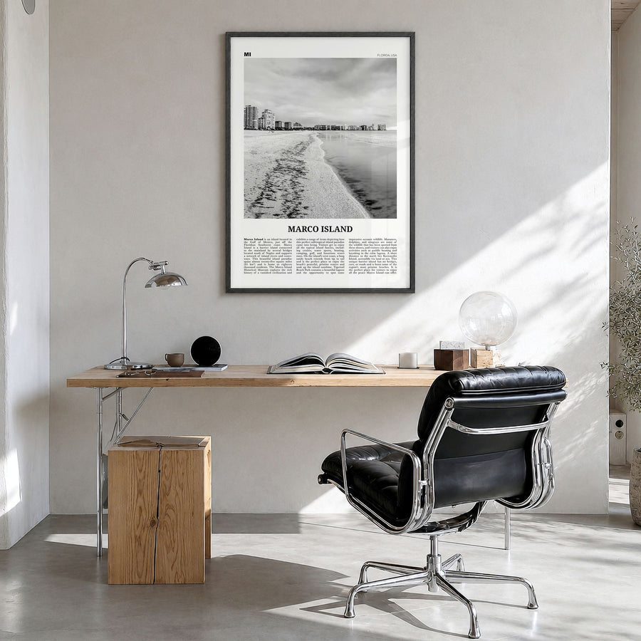 Marco Island Newspaper Poster in a black wood frame, hanging in a bright home office