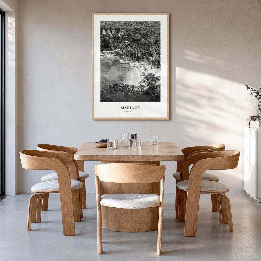 Marigot Classic Poster in a natural wood frame, hanging in a dining room