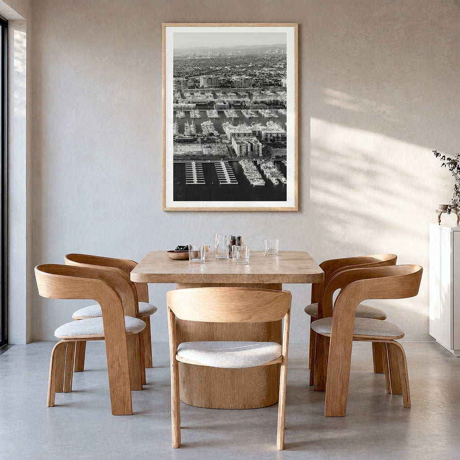 Marina del Rey Photo No 1 Poster in a natural wood frame, hanging in a dining room, white border