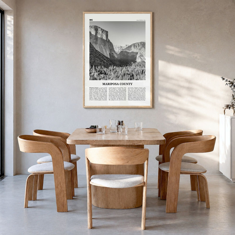 Mariposa County Newspaper Poster in a natural wood frame, hanging in a dining room