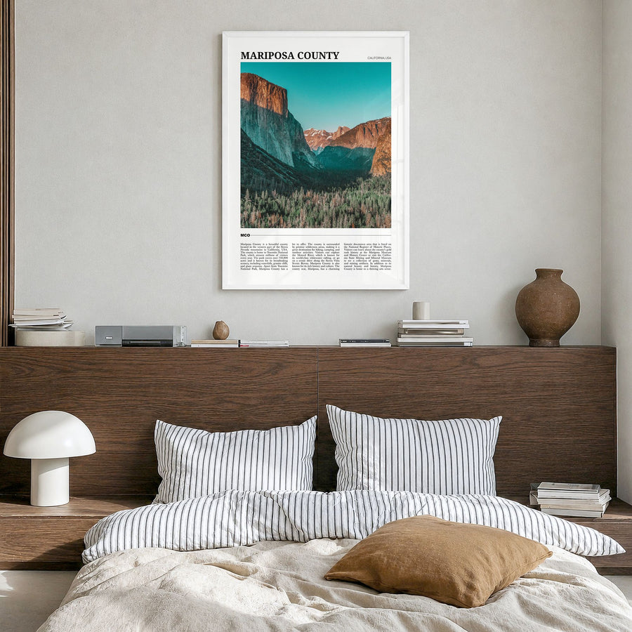 Mariposa County Travel Poster in a white wood frame, hanging in a bedroom