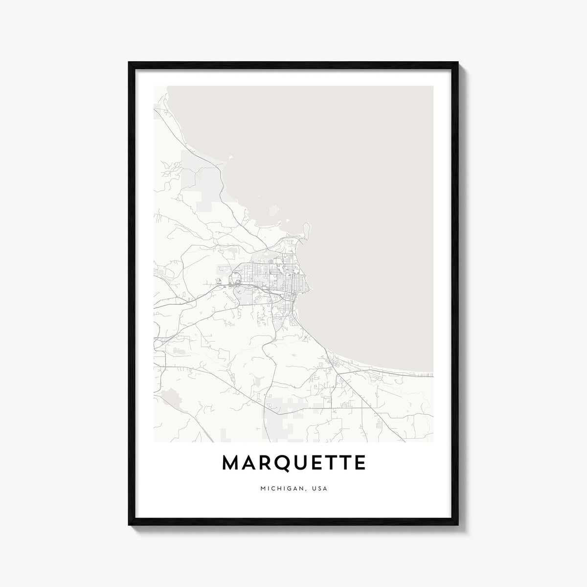 Marquette black & white map poster of Michigan, USA – vertical wall art, unframed print shown in interior mockup