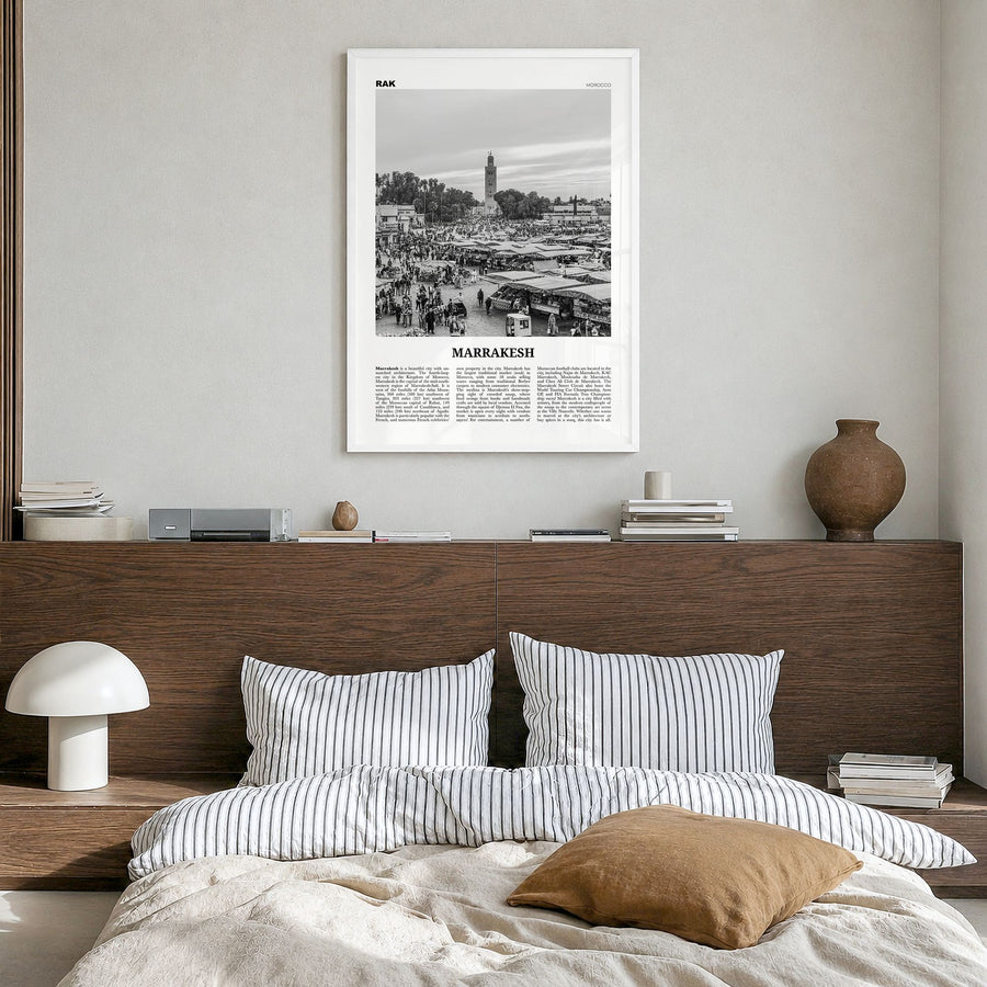Marrakesh Newspaper Poster in a white wood frame, hanging in a bedroom