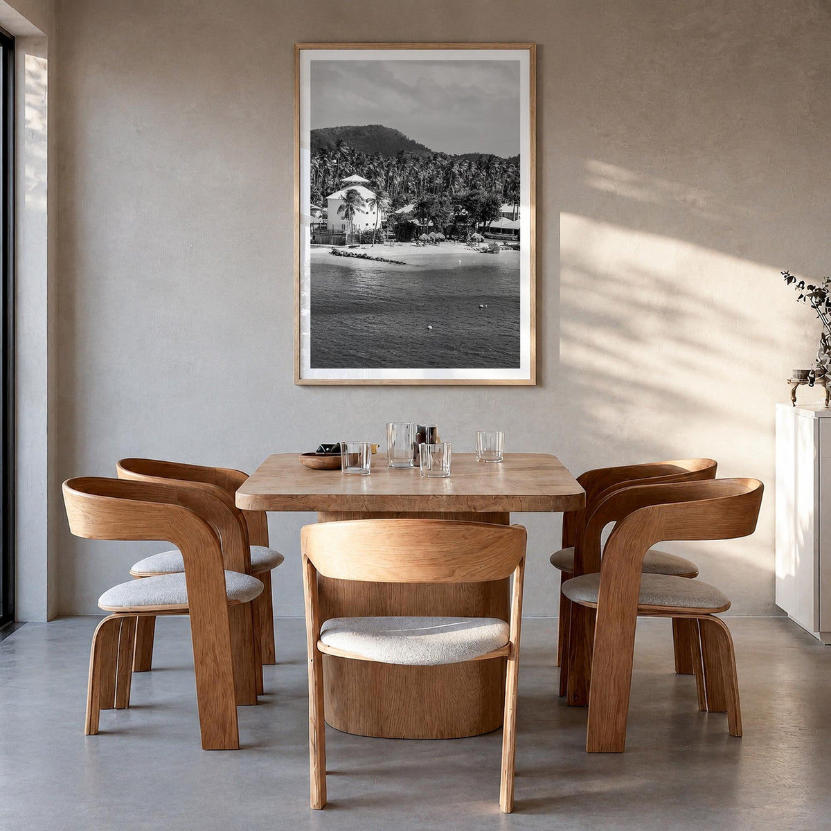 Martinique black & white photo poster of Caribbean – vertical wall art in natural wood frame with white border, hanging on wa