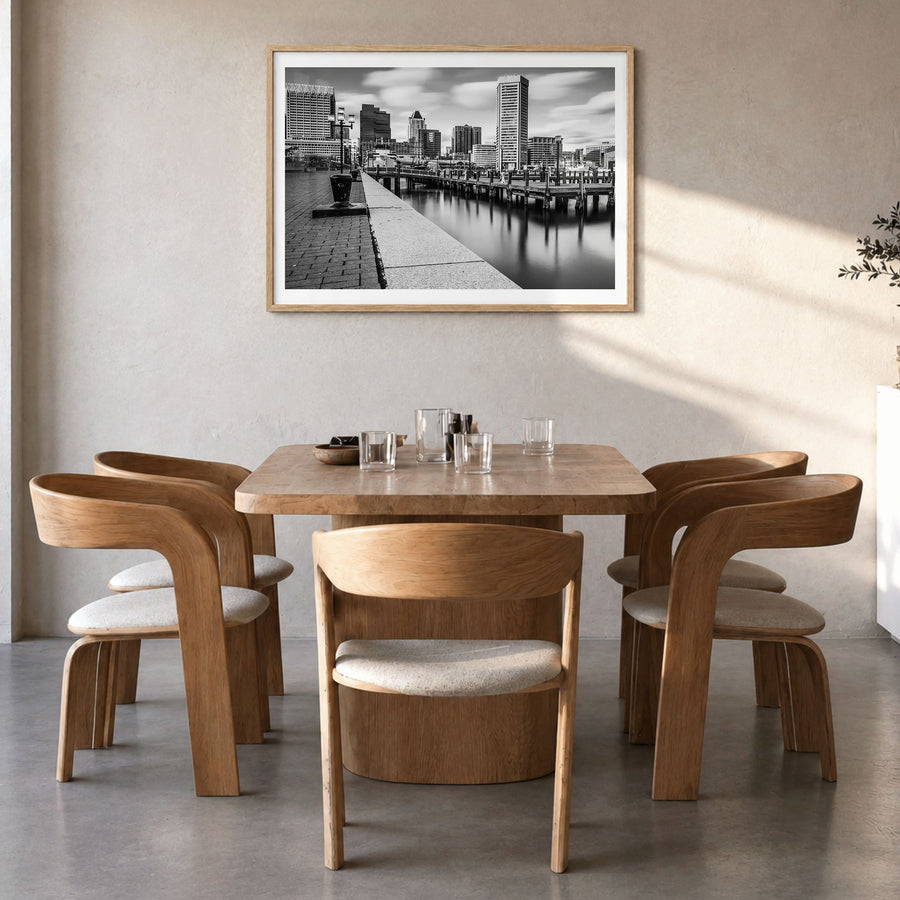 Maryland Photo Poster in a natural wood frame, hanging in a dining room, white border