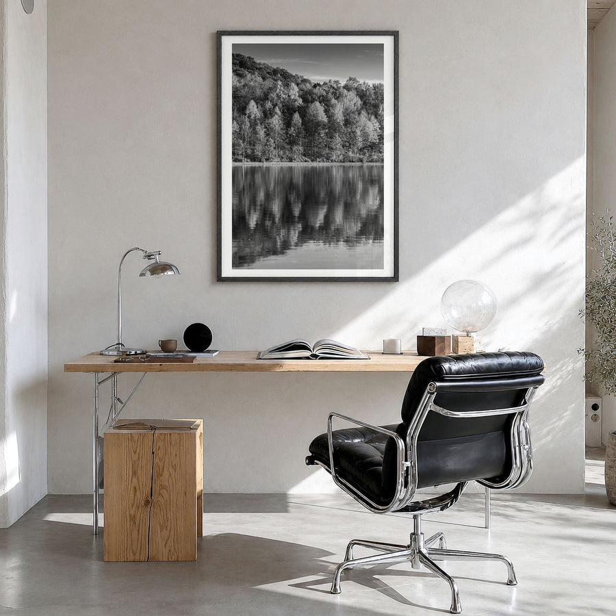 Maryland Photo Poster in a black wood frame, hanging in a bright home office, white border