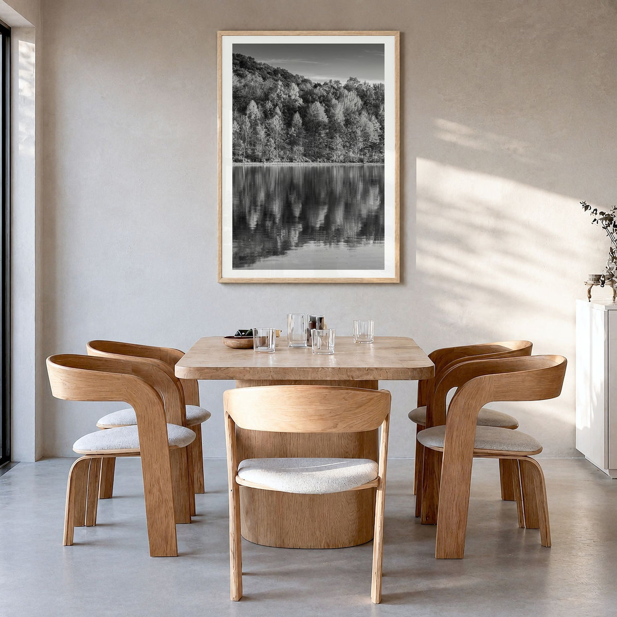 Maryland Photo Poster in a natural wood frame, hanging in a dining room, white border