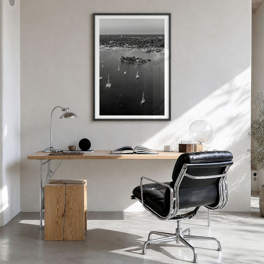 Massachusetts Photo Poster in a black wood frame, hanging in a bright home office, white border