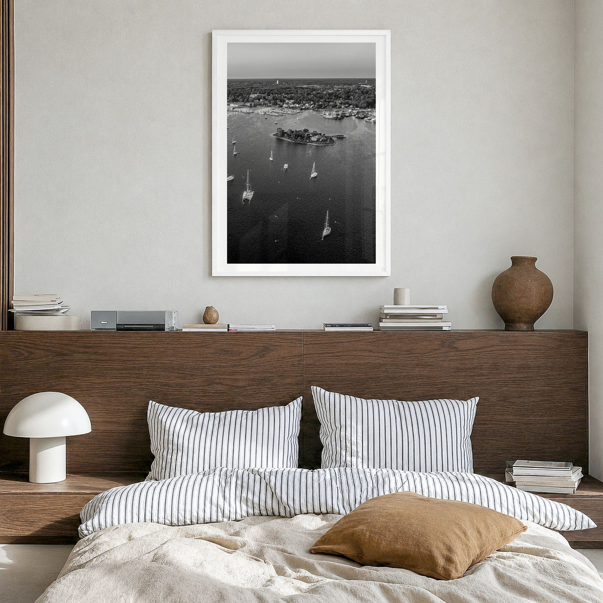 Massachusetts Photo Poster in a white wood frame, hanging in a bedroom, white border