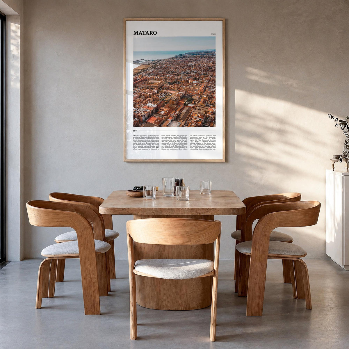 Mataró colorful travel poster of Spain – vertical wall art in natural wood frame, hanging on wall
