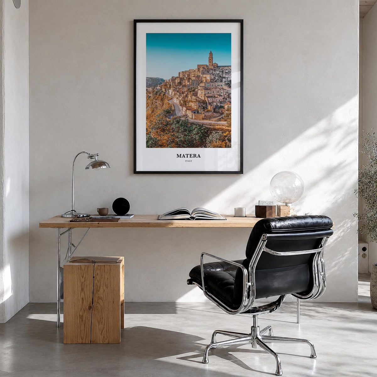 Matera colorful classic poster of Italy – vertical wall art in black wood frame, hanging on wall