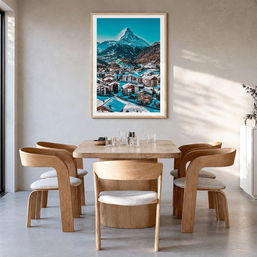 Matterhorn Photo Poster in a natural wood frame, hanging in a dining room, white border