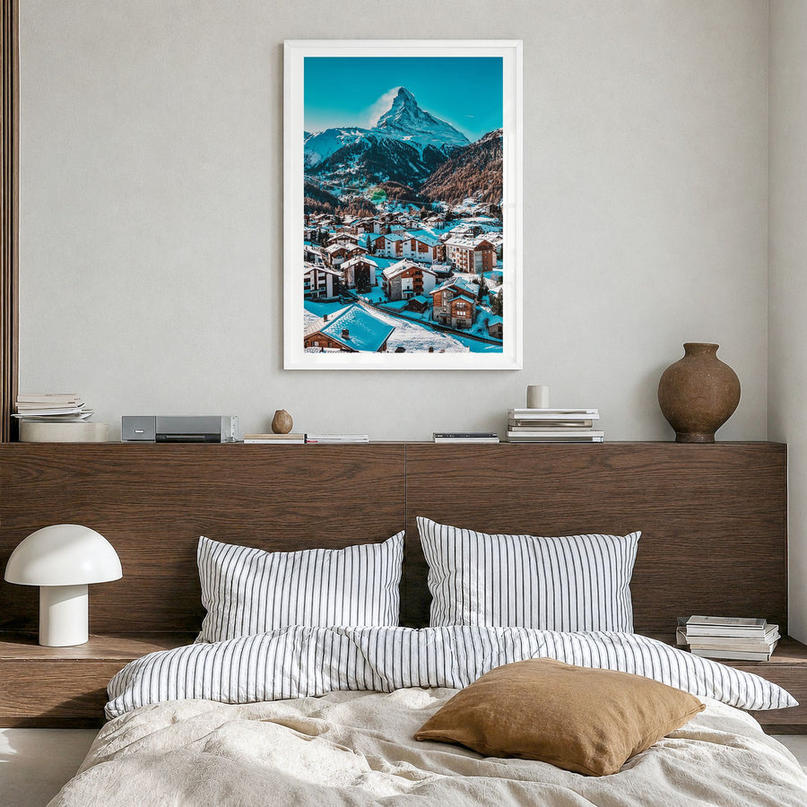 Matterhorn Photo Poster in a white wood frame, hanging in a bedroom, white border
