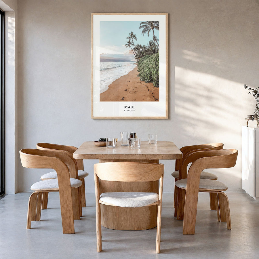 Maui Classic Poster in a natural wood frame, hanging in a dining room
