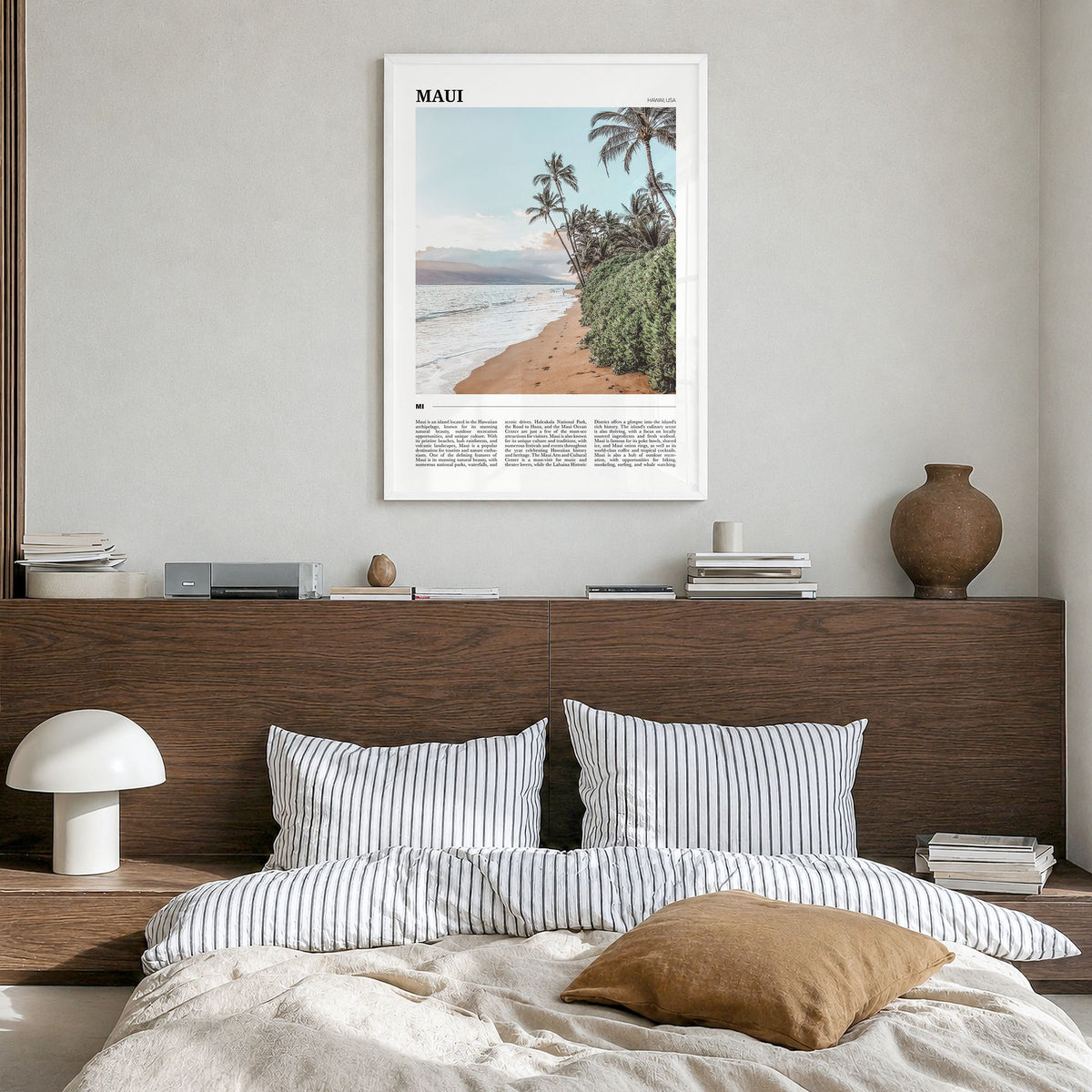 Maui Travel Poster in a white wood frame, hanging in a bedroom