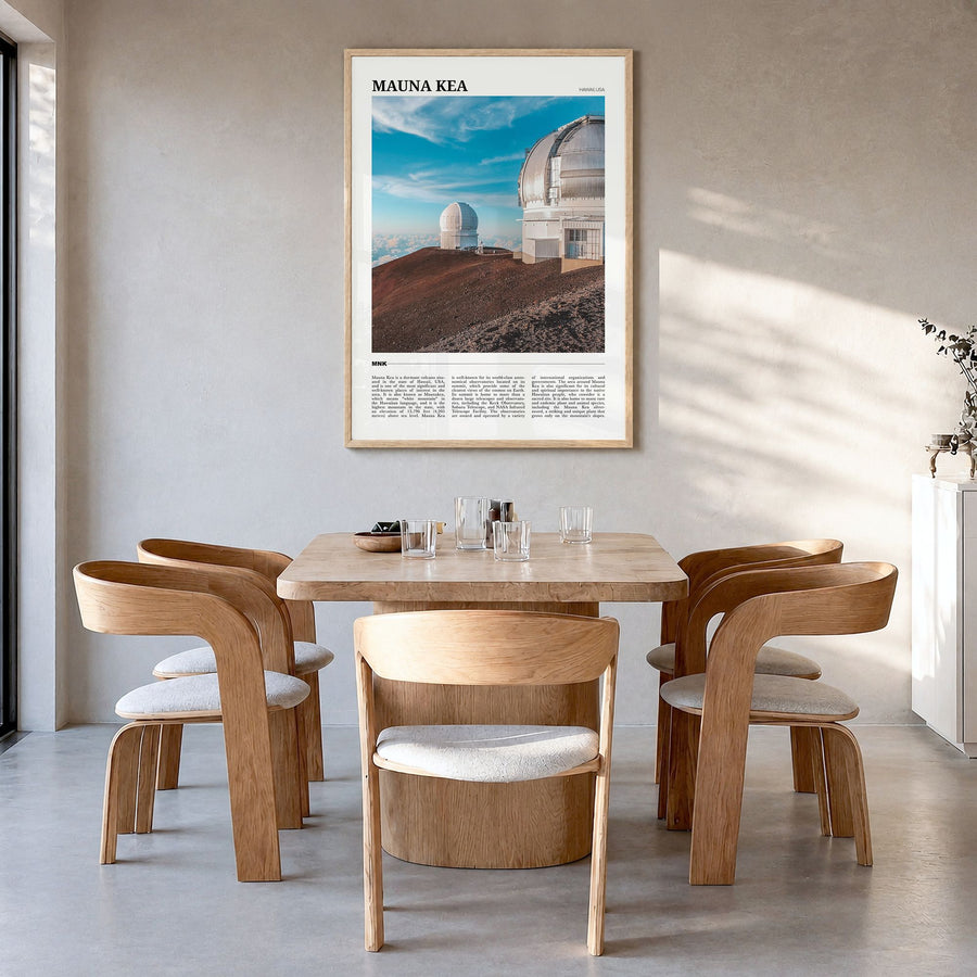 Mauna Kea Travel Poster in a natural wood frame, hanging in a dining room