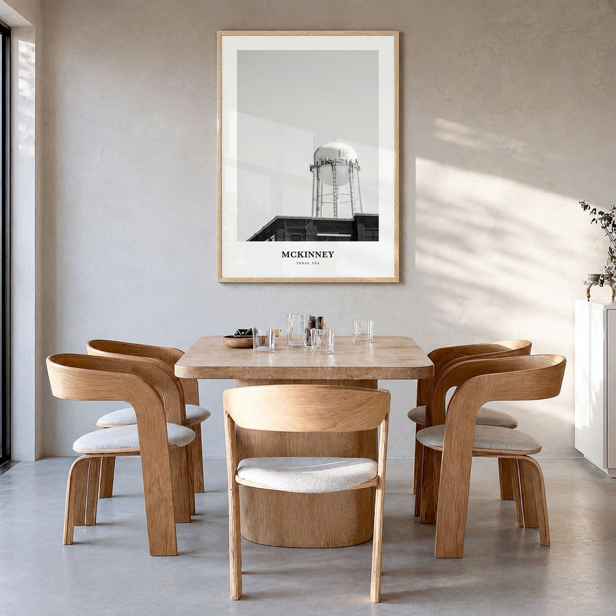 McKinney Classic Poster in a natural wood frame, hanging in a dining room