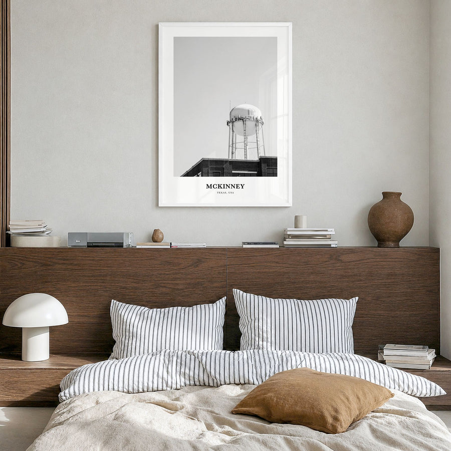 McKinney Classic Poster in a white wood frame, hanging in a bedroom