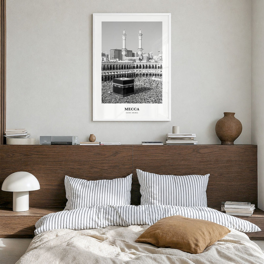 Mecca Classic Poster in a white wood frame, hanging in a bedroom