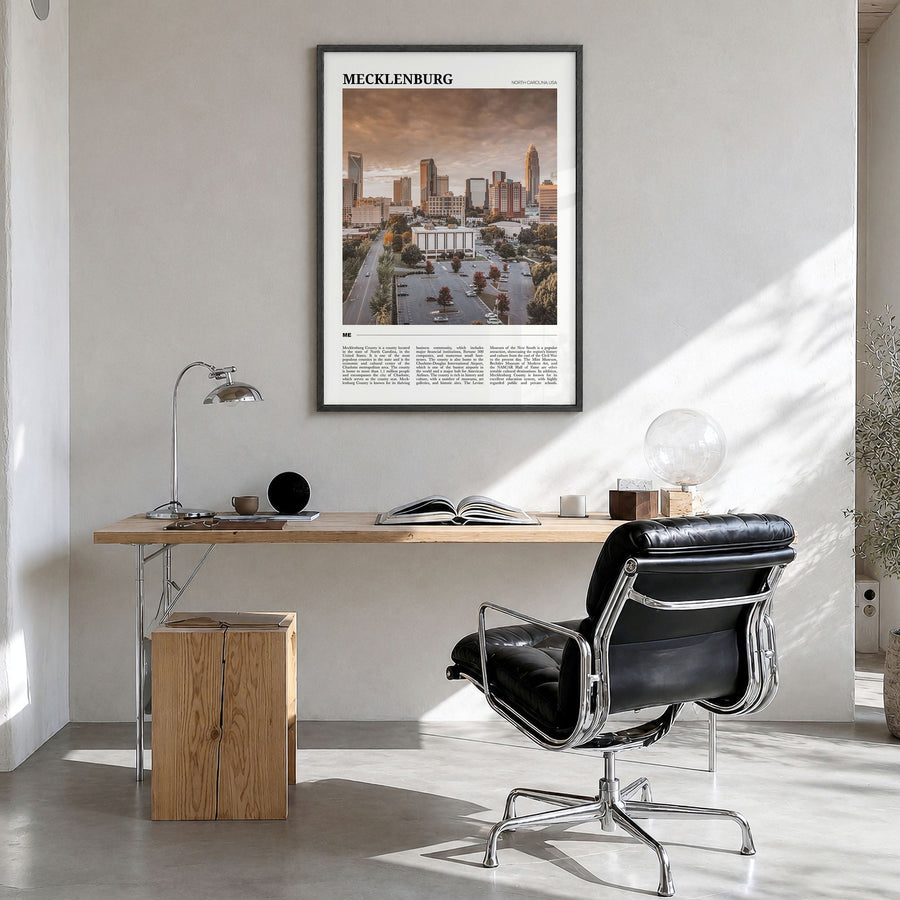Mecklenburg County Travel Poster in a black wood frame, hanging in a bright home office