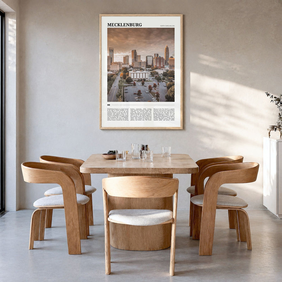 Mecklenburg County Travel Poster in a natural wood frame, hanging in a dining room