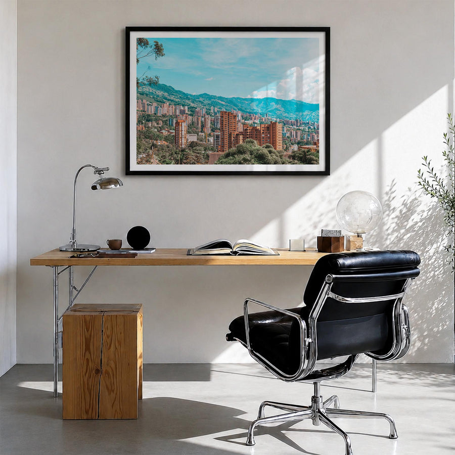 Medellín colorful photo poster of Colombia – horizontal wall art in black wood frame with white border, hanging on wall