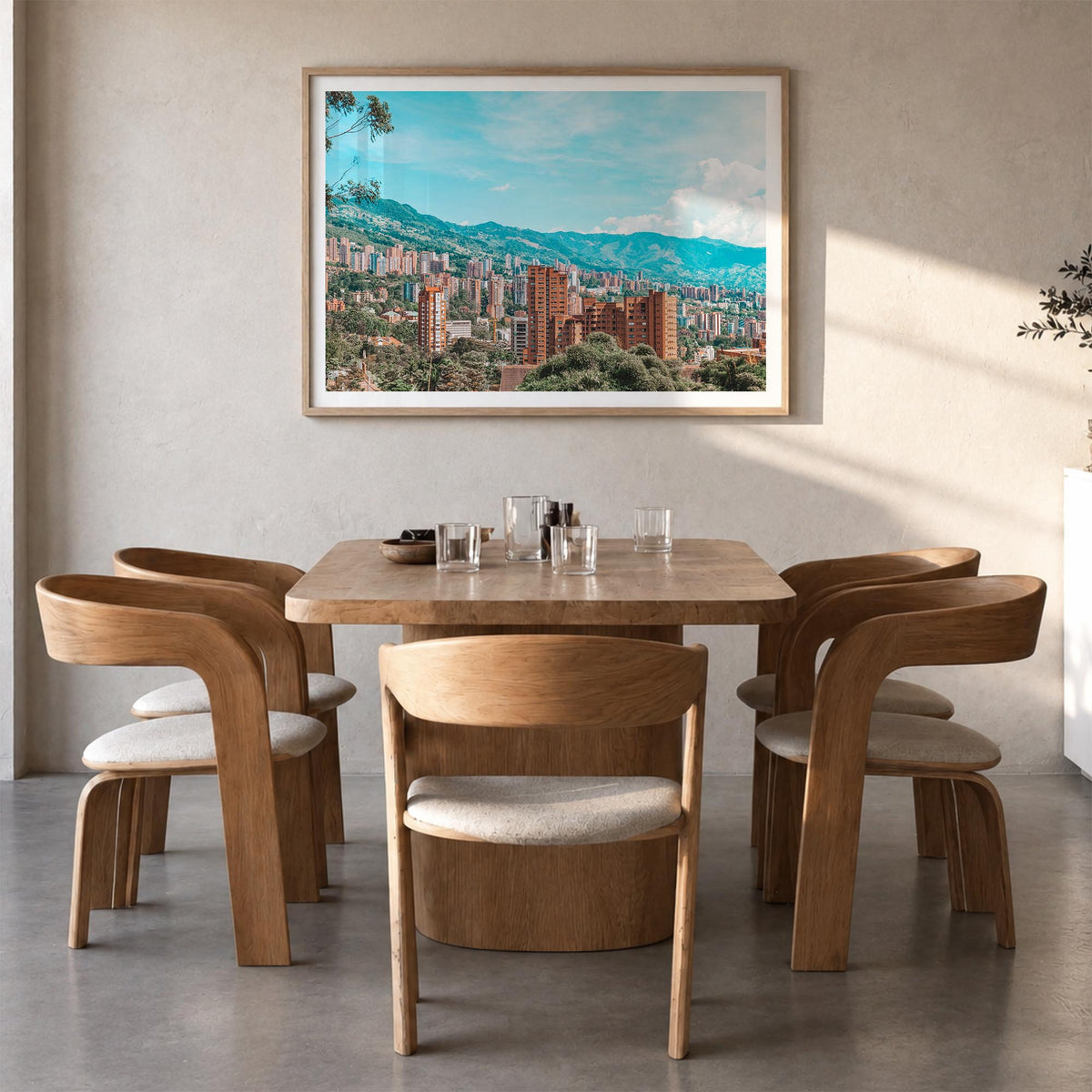 Medellín colorful photo poster of Colombia – horizontal wall art in natural wood frame with white border, hanging on wall