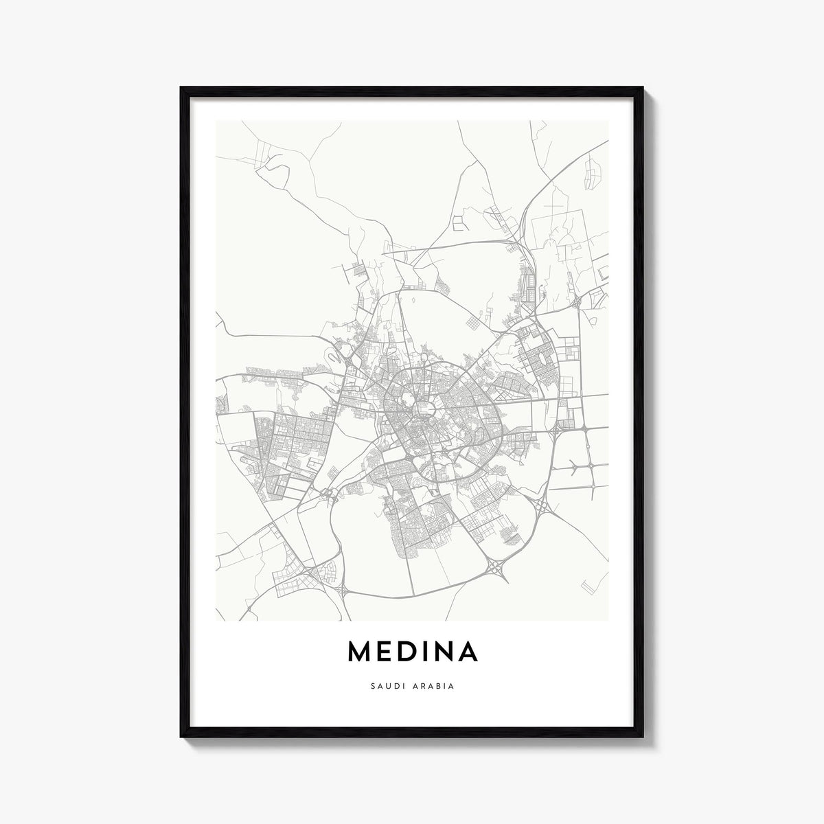 Medina black & white map poster of Saudi Arabia – vertical wall art, unframed print shown in interior mockup