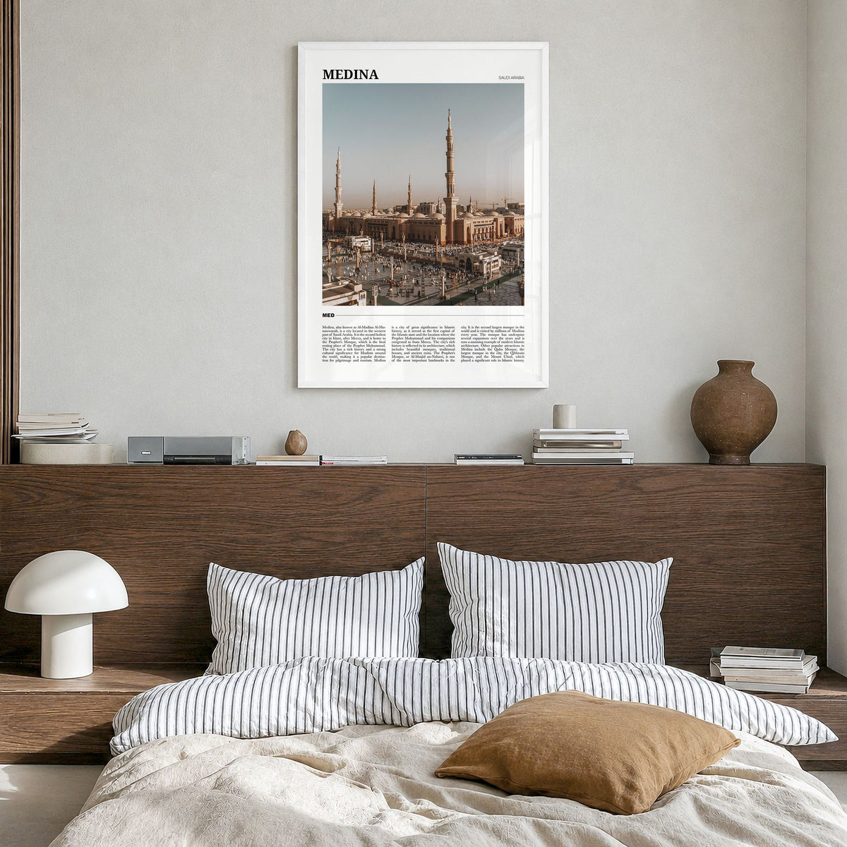 Medina Travel Poster in a white wood frame, hanging in a bedroom