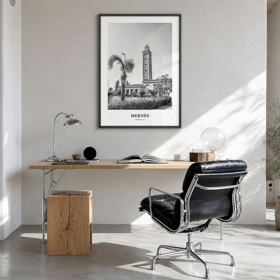 Meknès Classic Poster in a black wood frame, hanging in a bright home office