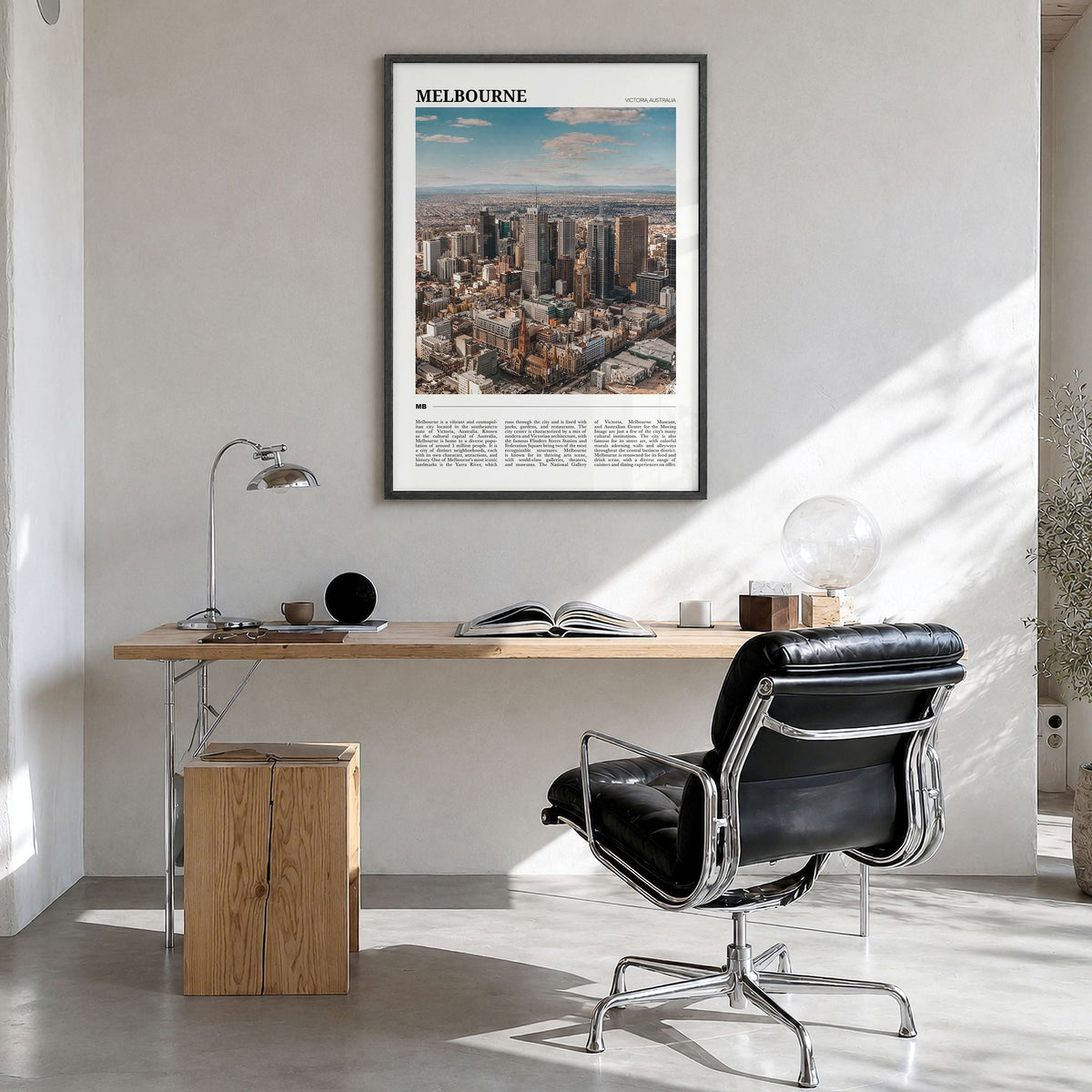 Melbourne Travel Poster in a black wood frame, hanging in a bright home office