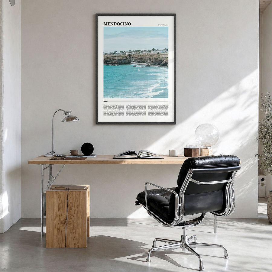 Mendocino Travel Poster in a black wood frame, hanging in a bright home office