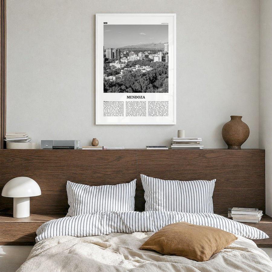 Mendoza Newspaper Poster in a white wood frame, hanging in a bedroom