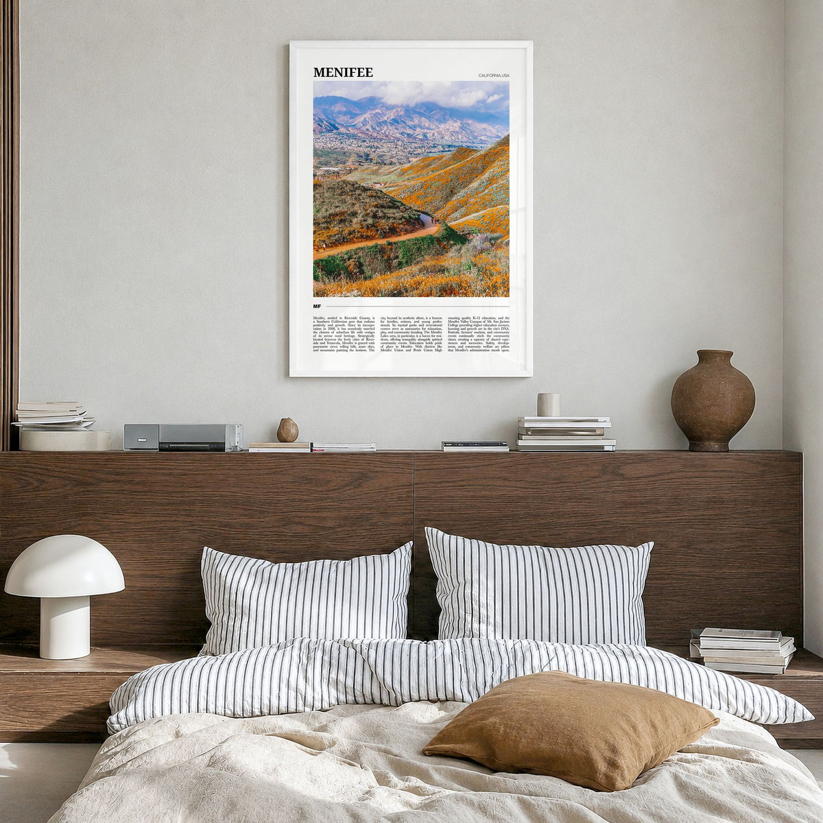 Menifee Travel Poster in a white wood frame, hanging in a bedroom