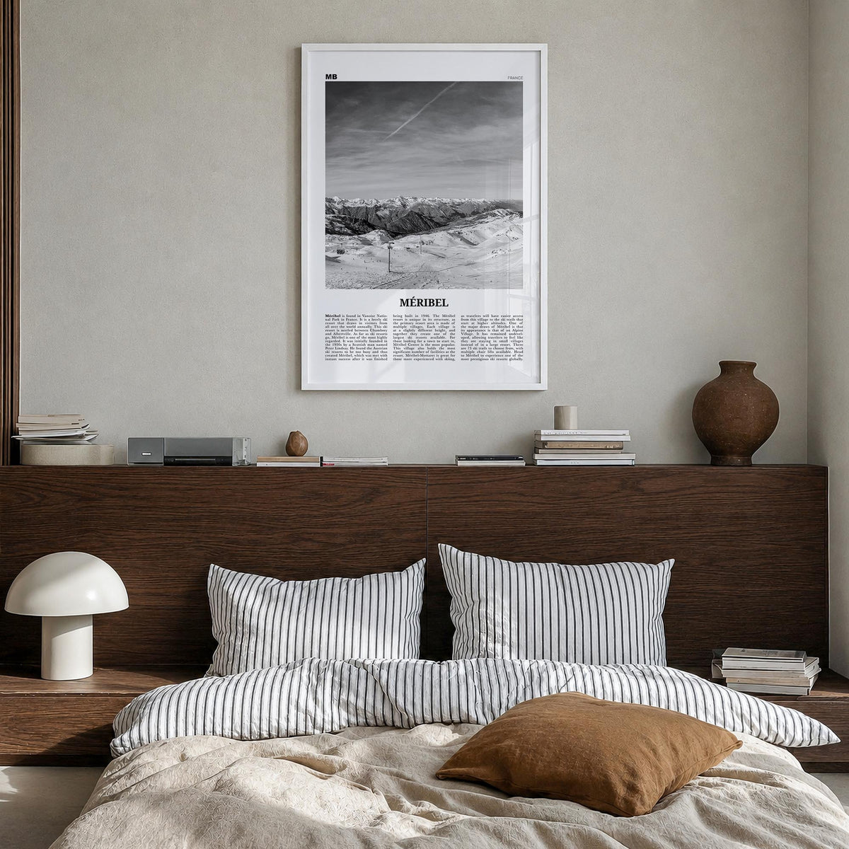 Méribel black & white newspaper poster of France – vertical wall art in white wood frame, hanging on wall