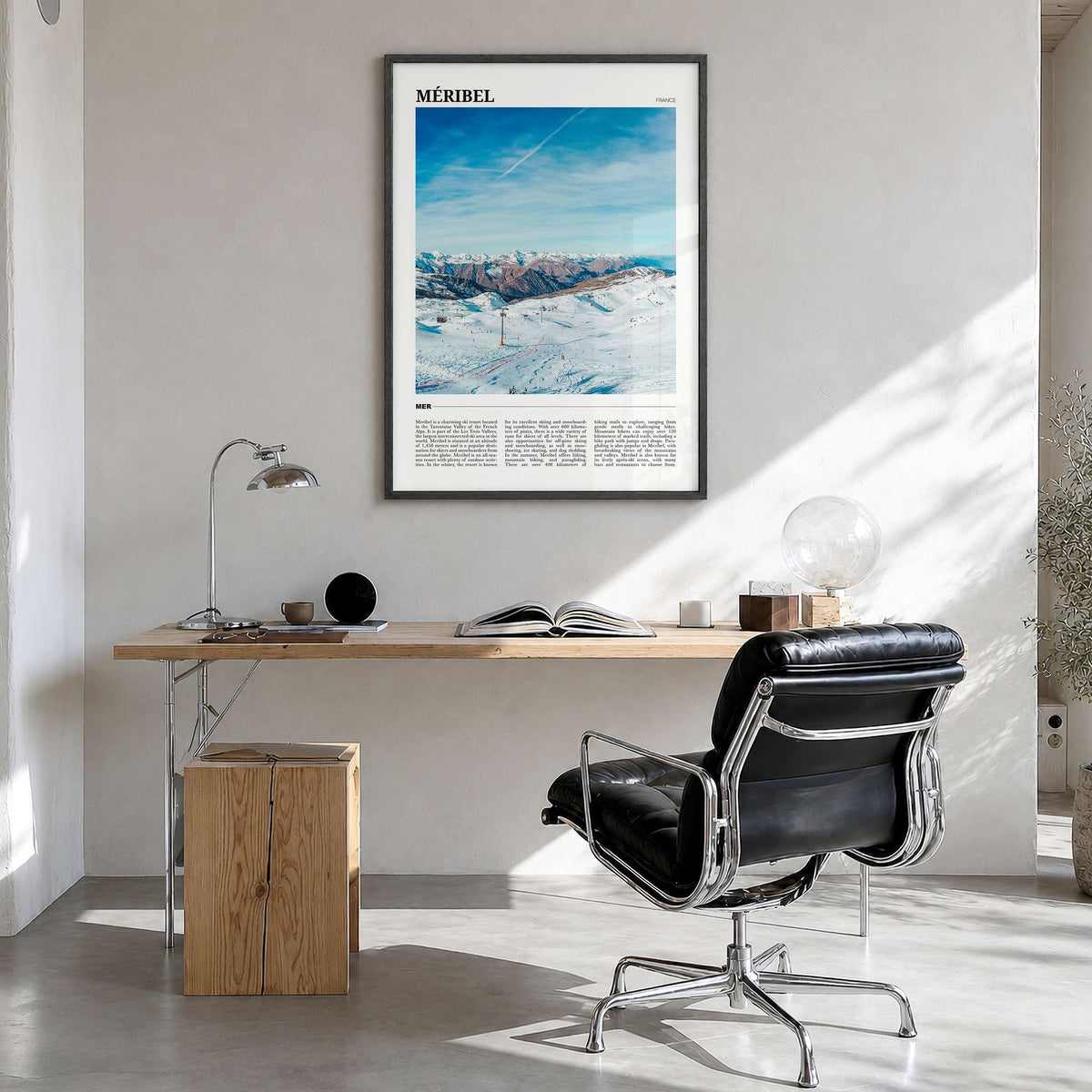 Méribel Travel Poster in a black wood frame, hanging in a bright home office