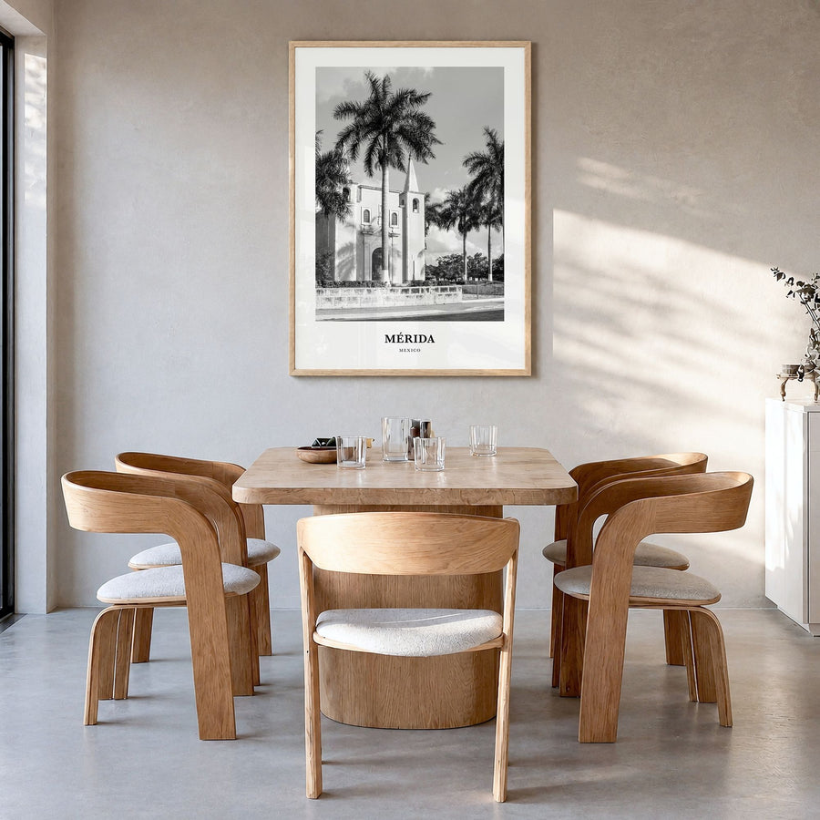 Mérida Classic Poster in a natural wood frame, hanging in a dining room