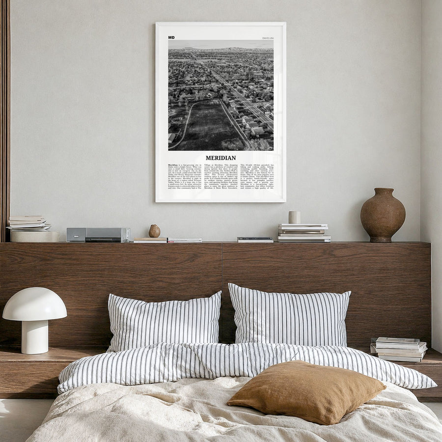 Meridian Newspaper Poster in a white wood frame, hanging in a bedroom