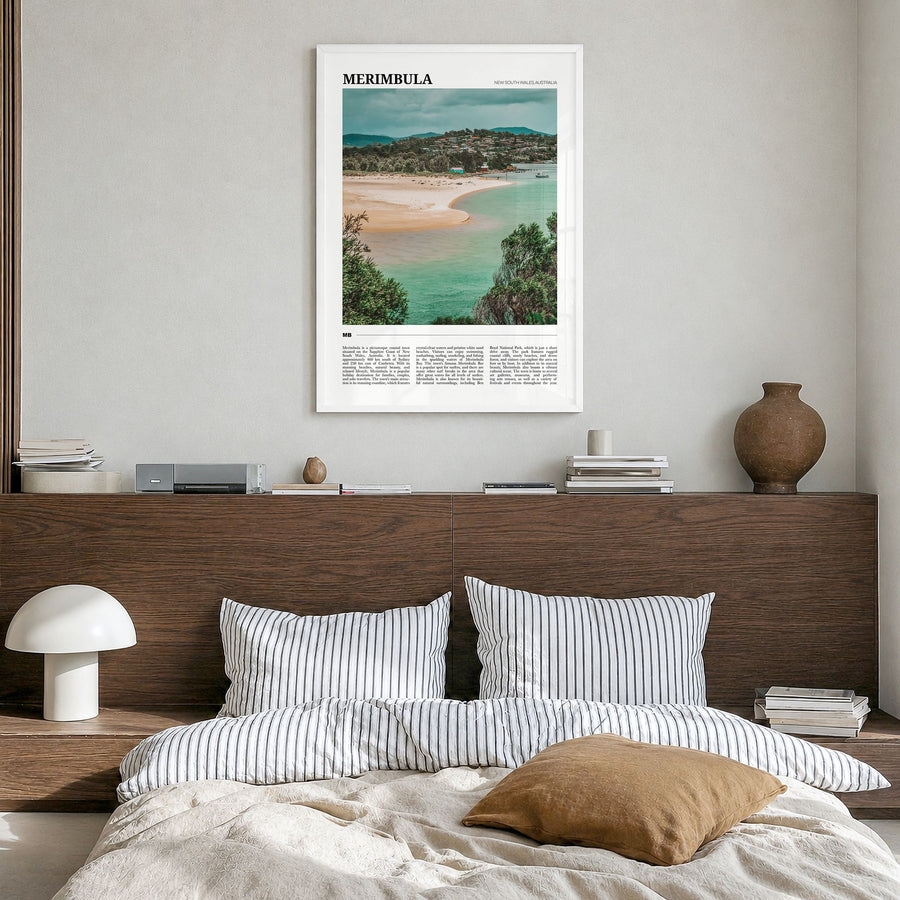 Merimbula Travel Poster in a white wood frame, hanging in a bedroom