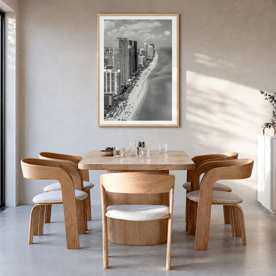 Miami Photo No 2 Poster in a natural wood frame, hanging in a dining room, white border