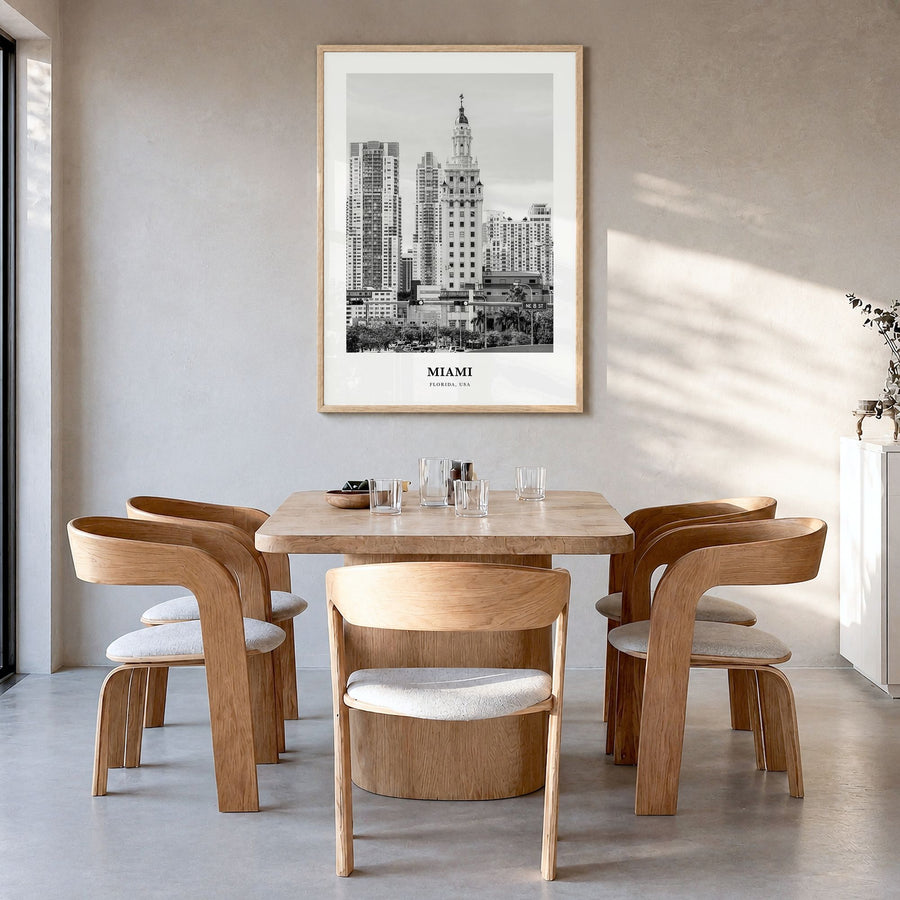 Miami Classic No 1 Poster in a natural wood frame, hanging in a dining room