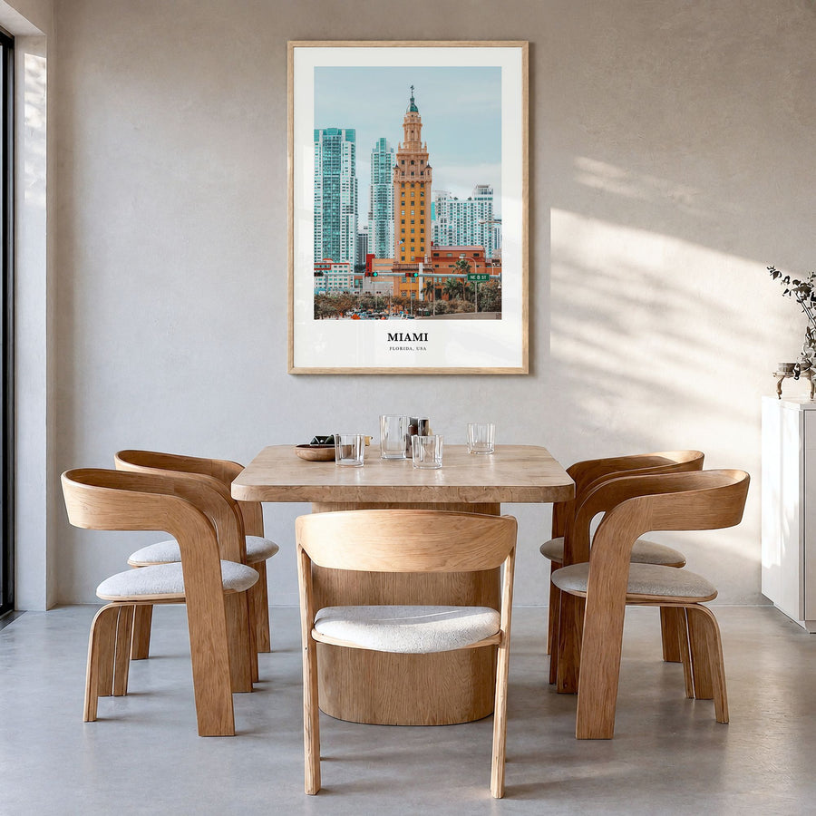 Miami Classic No 2 Poster in a natural wood frame, hanging in a dining room