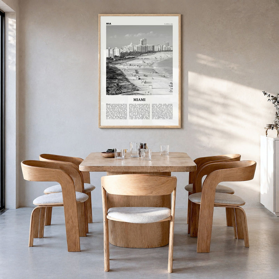 Miami Newspaper No 1 Poster in a natural wood frame, hanging in a dining room