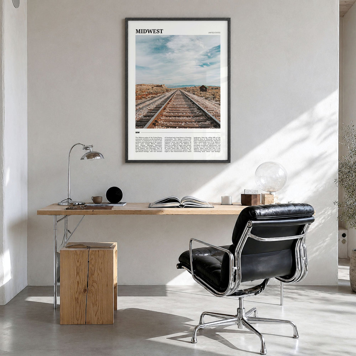 Midwest Travel Poster in a black wood frame, hanging in a bright home office