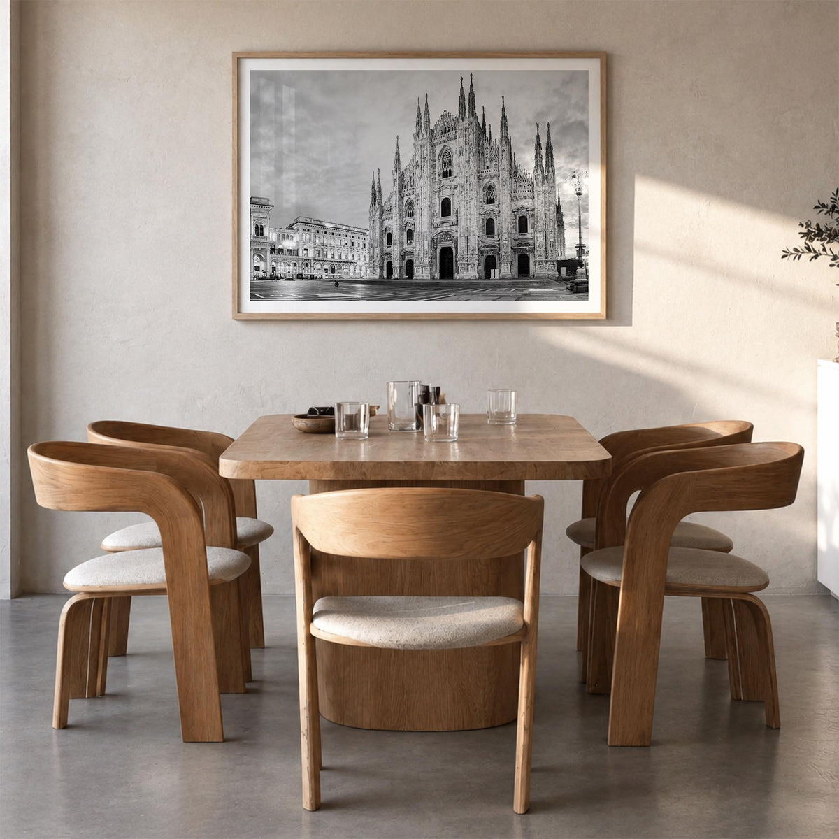 Milan black & white photo poster of Italy – horizontal wall art in natural wood frame with white border, hanging on wall