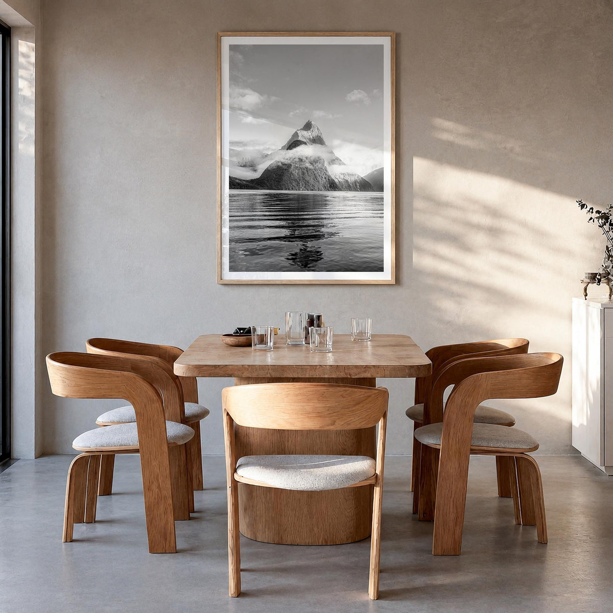 Milford Sound black & white photo poster of New Zealand – vertical wall art in natural wood frame with white border, hanging 