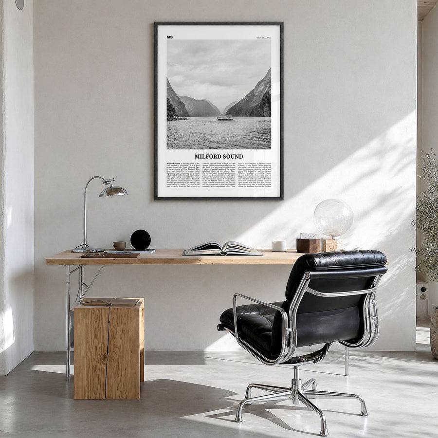 Milford Sound Newspaper Poster in a black wood frame, hanging in a bright home office
