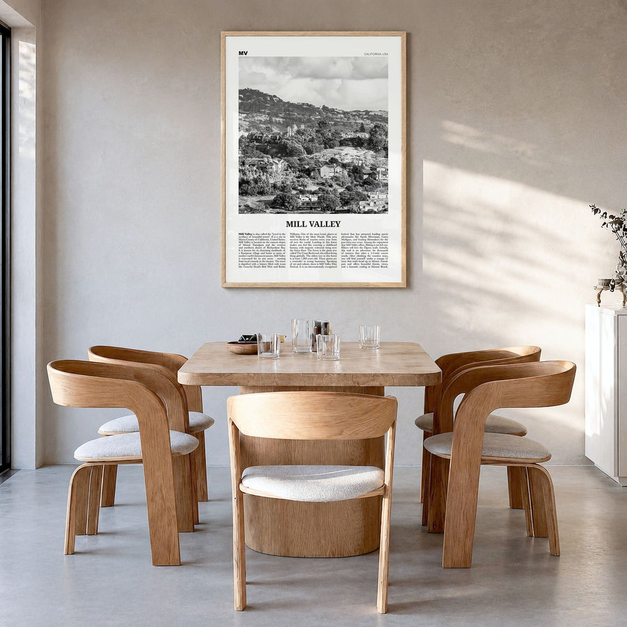 Mill Valley Newspaper Poster in a natural wood frame, hanging in a dining room